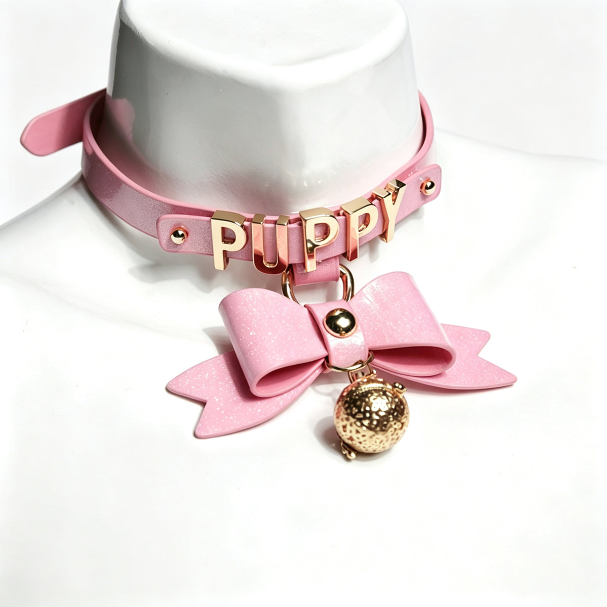 WILDCHOK Pink Glitter TPU Choker | Bow, LED Bell & Metal Letter Decor