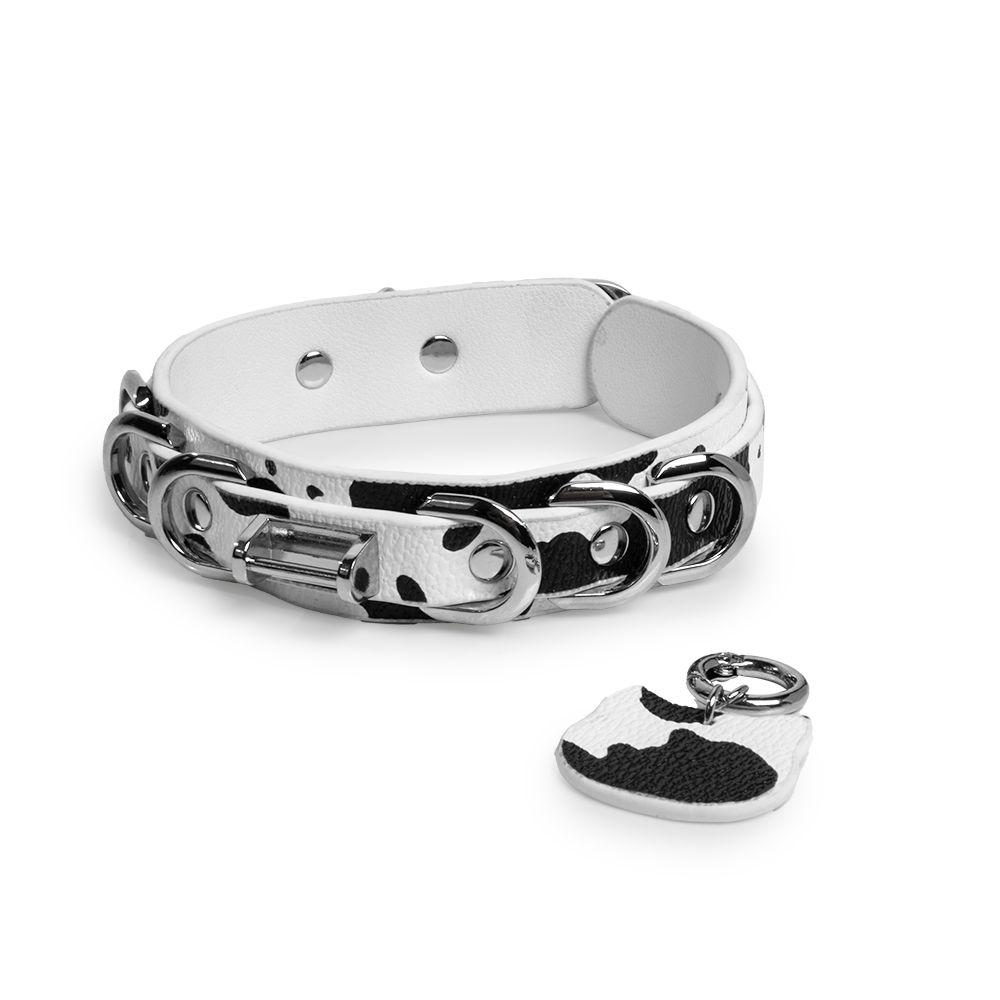WILDCHOK Black‑White Cow Print O‑Ring Choker | Adjustable PU Leather Necklace with Cat‑Head Charm