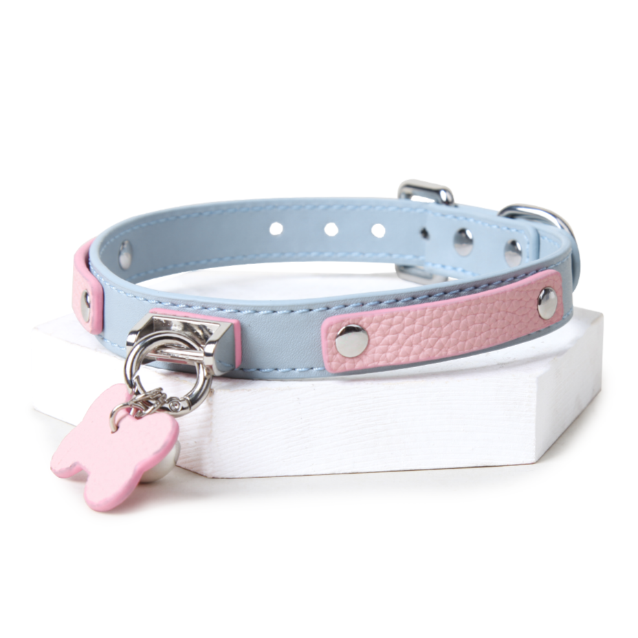 WILDCHOK Pink‑Blue Two‑Tone Cowhide Choker, Adjustable Necklace with Bone Charm & Bell