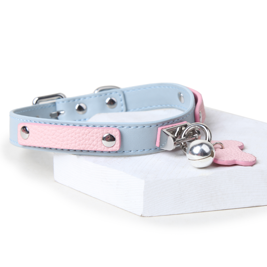 WILDCHOK Pink‑Blue Two‑Tone Cowhide Choker, Adjustable Necklace with Bone Charm & Bell